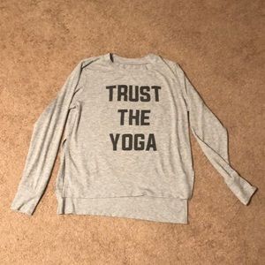 ALO yoga gray top with split side seam and text
